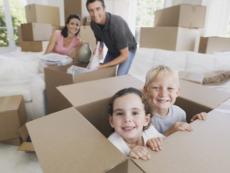 Packed boxes and labelled items ready for house removals in Hackneymarshes