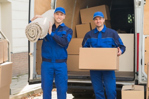 Labelled boxes and packed items inside a storage unit