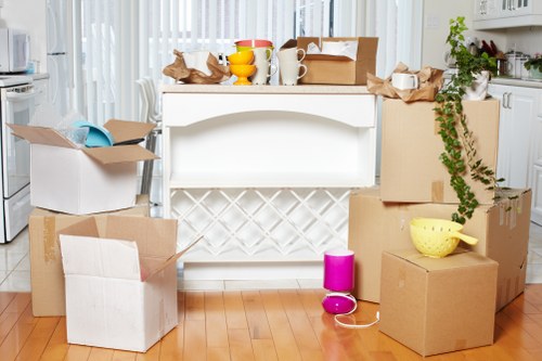 Removal team handling furniture during a Hackneymarshes home move