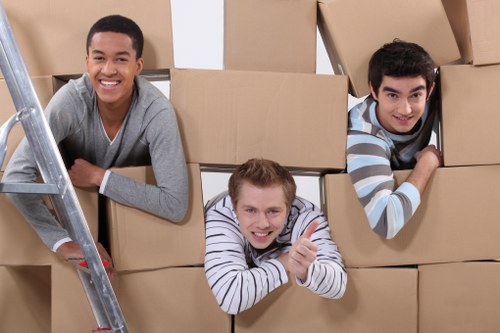 Stacked boxes and labeled containers in local storage