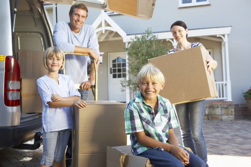 Local packing team in Hackneymarshes sorting household belongings for transport
